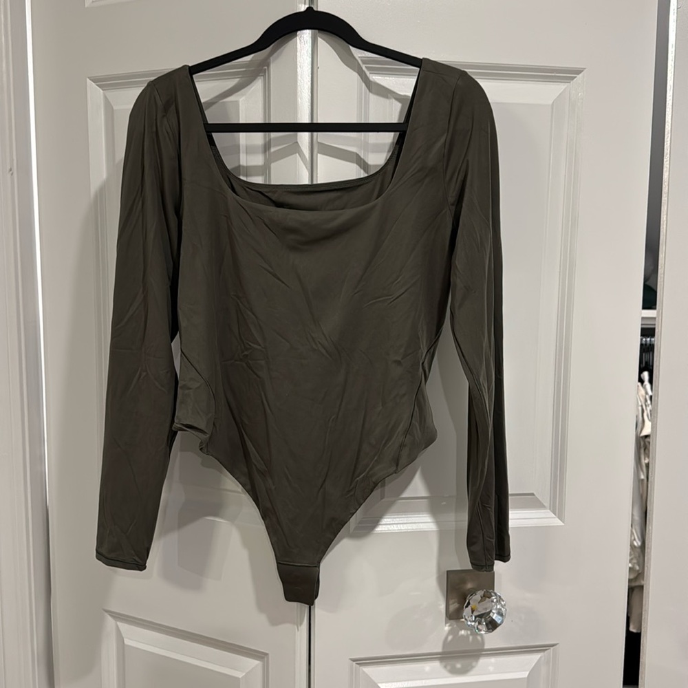 Lululemon bodysuit 
New without tags; never worn
Softest jersey material
